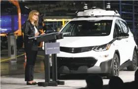  ?? Eric Seals / Detroit Free Press ?? General Motors CEO Mary Barra speaks at an assembly plant in Orion Township, Mich. GM is testing 180 self-driving Chevrolet Bolts.
