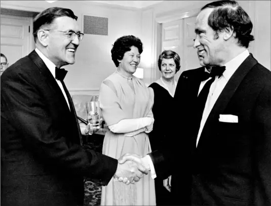  ?? TORONTO STAR FILE PHOTO ?? Beland Honderich greets Prime Minister Pierre Elliott Trudeau at a reception in 1970. Two years later, he put his initials on an editorial explaining why the Star was supporting Progressiv­e Conservati­ve Robert Stanfield over Trudeau in the federal...