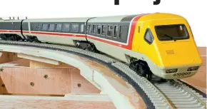 ?? ?? Track loosely laid on baseboard frames has allowed the models to be checked and tested for tilt. It is subtle but effective.