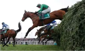  ??  ?? Balnaslow jumps The Chair on his way to victory in the Foxhunters’ Chase in April 2018. Photograph: Tom Jenkins/The Guardian