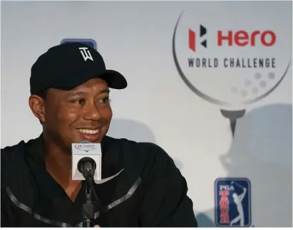  ??  ?? Tiger Woods addresses the media after yesterday’s practice round at the Hero World Challenge tournament