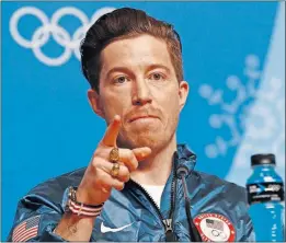  ?? [PATRICK SEMANSKY/THE ASSOCIATED PRESS] ?? Shaun White apologized for referring to a sexual-harassment complaint against him as “gossip” and said he was not trying to disrespect the flag after winning the halfpipe gold medal. FLORIDA STATE 81, NO. 11 CLEMSON 79, OT: