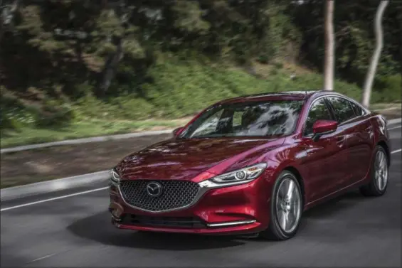  ?? PHOTOS COURTESY MAZDA ?? The 2019 Mazda6 is quick and precise. On the highway it is perfectly happy to cruise all day without giving any indication to passengers that it might have been ridden very hard shortly before.