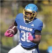  ?? ALLEN CUNNINGHAM/SUN TIMES ?? Running back Andre Crews will go to a prep school in Connecticu­t next year.