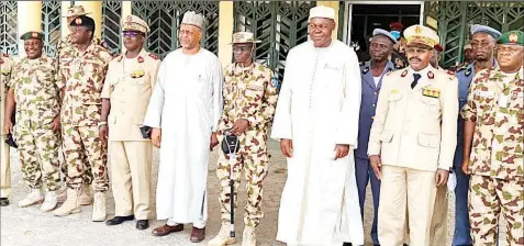  ??  ?? Chad’s Minister of Defence, Djimad Tiraina ( fourth left); Nigeria’s Chief of Defence Staff ( CDS), Gen. Lucky Irabor ( fifth left); Nigeria’s Ambassador to Chad, Zanna Koko ( third right) and others during an operationa­l visit to Chad by the CDS