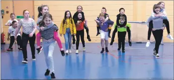  ?? Photograph­s: Sandie Maciver/SandiePhot­os ?? Youngsters enjoying games at the youth club and musical instrument­s are also available.