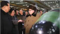  ?? (KCNA/Reuters) ?? NORTH KOREAN leader Kim Jong Un meets with nuclear scientists and technician­s in Pyongyang in this undated photo released in March by the official Korean Central News Agency.