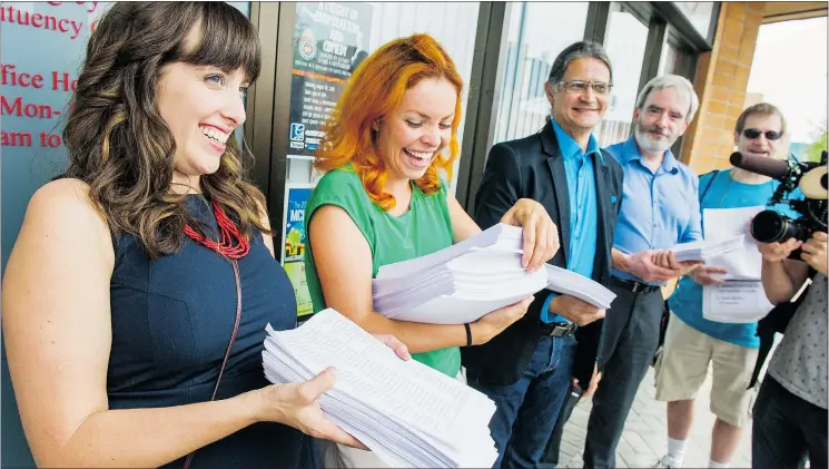  ?? RIC ERNST/PNG FILES ?? Liz McDowell, left, who started an online petition that drew over 225,000 signatures, says it’s ‘disappoint­ing’ industrial users won’t be charged more for water.