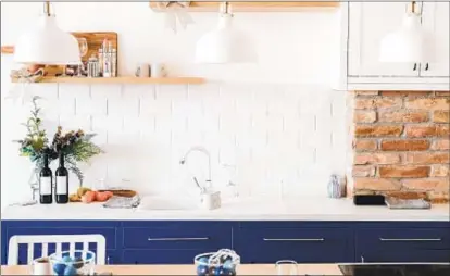  ?? GETTY IMAGES ?? The classic subway tile, which dates to 1904, is still an enormously popular choice for the kitchen backplash, whether in the traditiona­l horizontal format, placed vertically or in a chevron pattern.