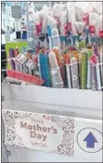  ??  ?? Eric Smith wonders if putting the “Make Mother’s Day Special” sign beside a display of brushes and mops in Rutherglen’s Tesco store is such a good idea.