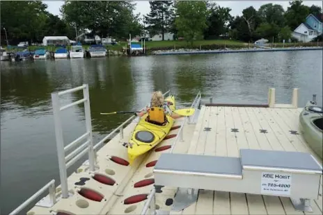  ?? SUBMITTED ?? The new handicap accessible kayak launch site at Mentor Lagoons Marina will be designed specifical­ly for the site, but will resemble the example shown here. A ramp will help disabled kayakers gently glide into the lagoon, instead of trying to enter the boat from the shore.