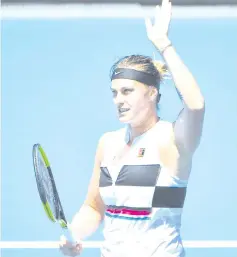  ??  ?? Belarus’ Aryna Sabalenka waves after beating Russia’s Anna Kalinskaya during their women’s singles match on day one of the Australian Open tennis tournament in Melbourne on January 14, 2019. - AFP photo