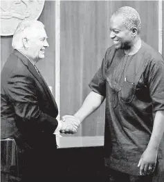  ?? — Reuters photo ?? Tillerson and Nigeria’s Foreign Minister Geoffrey Onyeama shake hands after their news conference in Abuja, Nigeria.