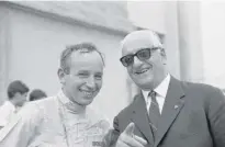  ??  ?? British driver John Surtees ( left) with Italian racing car manufactur­er Enzo Ferrari in 1964.
| AP