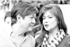  ?? — Reuters photo ?? Ferdinand Marcos Jr talks to sister Imee during a political rally in Manila.