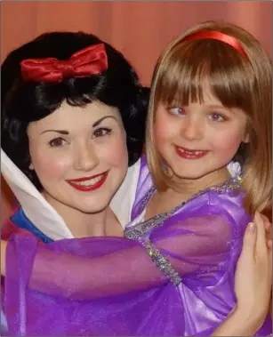  ?? ?? SPECIAL MEMORIES: Darcy with Snow White during a family trip to EuroDisney in 2013. Darcy enjoyed a private audience with Snow White and loved every second.