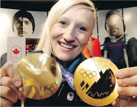  ?? FILES ?? Kaillie Humphries shows off her two Olympic gold medals, won in Vancouver in 2010 and Sochi in 2014. She says she may extend her career if Calgary lands the 2026 Games. She would be 40 at that point, but says in her sport, she could still compete.