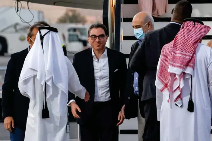  ?? ?? Siamak Namazi and other former detainees arrive at the Doha internatio­nal airport in Qatar on 18 September 2023. Photograph: Karim Jaafar/AFP/Getty Images