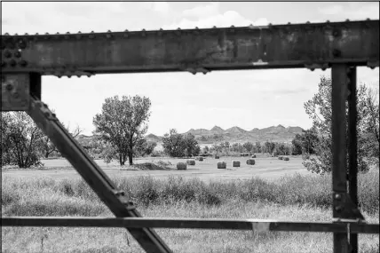  ?? KRISTINA BARKER / THE NEW YORK TIMES ?? A view of the Powder River in Custer County, Mont. Some 67,000 acres near here went for just $1.50 per acre annually after one investor asked that it be put up for auction and no other companies bid.