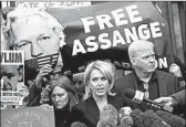  ?? ALASTAIR GRANT/AP ?? Jennifer Robinson, center, claims Ecuador lied about Julian Assange to justify his eviction last week.