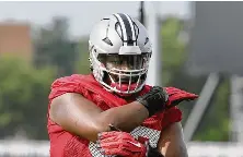  ?? DAVID JABLONSKI / STAFF ?? Lakota West High School graduate Tegra Tshabola is expected to get a long look at tackle this spring after being one of the secondteam guards as a true freshman.