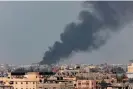  ?? Photograph: Said Khatib/AFP/ Getty Images ?? In a picture taken from Rafah, smoke billows over Khan Younis after Israeli bombardmen­t in the southern Gaza Strip on 14 March 2024.