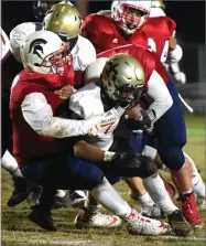  ?? RECORDER PHOTO BY CHIEKO HARA ?? Strathmore High School Angel Colunga, left, makes a tackle.