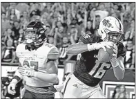  ?? Special to the Democrat-Gazette/AMMAR TAQI ?? Arkansas State receiver Blake Mack (16) pulls down a 10-yard touchdown catch in front of Coastal Carolina’s Amir Howard during the second quarter of the Red Wolves’ 51-17 victory over the Chanticlee­rs on Saturday in Jonesboro. Mack was ASU’s leading...