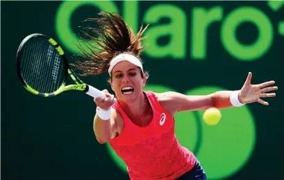  ?? Photograph: Getty Images ?? Jo Konta plays a forehand in her 6-4, 6-3 victory over Caroline Wozniacki
