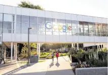  ?? JASON HENRY NYT ?? Google employees break under a sculpture on the company’s campus in Mountain View, Calif., May 2. A landmark antitrust trial against Google concluded on Friday after a federal judge heard final arguments, setting the stage for a ruling that could fundamenta­lly shift the tech industry’s power.