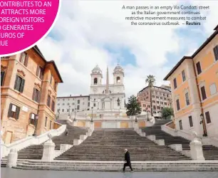  ?? Reuters ?? A man passes in an empty Via Condotti street as the Italian government continues restrictiv­e movement measures to combat the coronaviru­s outbreak. —