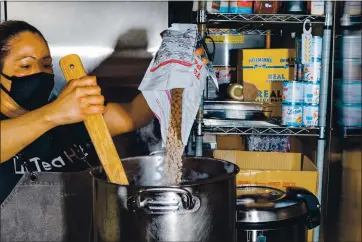  ?? PHOTOS BY KELSEY MCCLELLAN — THE NEW YORK TIMES ?? A worker prepares boba tea at Teahut in San Francisco on Thursday. Boba tea’s signature ingredient, tapioca pearls, could soon be in short supply because of massive delays at California ports unloading cargo ships from Asia.