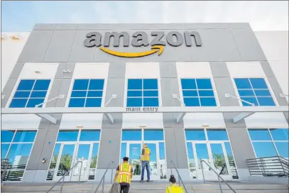  ?? Elizabeth Brumley Las Vegas Review-journal ?? An Amazon warehouse in North Las Vegas will have more company in 2021, with three more centers coming to the valley.