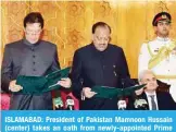  ?? AFP ?? ISLAMABAD: President of Pakistan Mamnoon Hussain (center) takes an oath from newly-appointed Prime Minister Imran Khan (left) during a ceremony as caretaker prime minister Nasirul Mulk (sitting) looks on yesterday.—