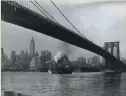  ?? AP ?? The Brooklyn Bridge is seen in a photo of the Manhattan skyline from 1930.