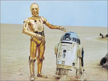  ?? ?? C-3PO and R2-D2 in the 1977 film Star Wars Episode IV