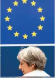  ??  ?? Theresa May leaves the European leaders’ summit