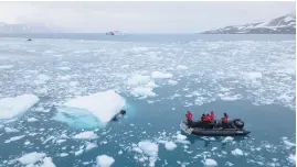  ?? Pictures: AFP ?? SOUND BITES. Colombian Navy divers take samples on Livingston Island in the South Shetland Islands last month.