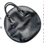  ??  ?? “I use this Commes des Garçons leather bag for my laptop. The shape is so unorthodox, it always commands attention when I walk into places”