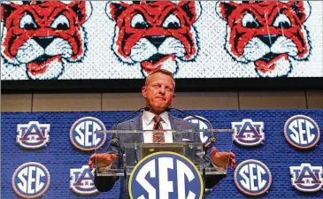  ?? CURTIS COMPTON/AJC 2022 ?? Much of the staff under Bryan Harsin (above) is new, including wide receivers coach and former NFL player Ike Hilliard. The Tigers, picked to finish last in the SEC West, face a tough year.