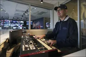  ?? BRYNN ANDERSON — THE ASSOCIATED PRESS ?? Atlanta Braves’ organist Matthew Kaminski plays an organ overlookin­g Truist Field before Game 4of baseball’s World Series between the Houston Astros and the Atlanta Braves Saturday, Oct. 30, 2021, in Atlanta. Kaminski, the organist since the start of the 2009 season, has performed at more than 1,000games and become a bit of a cult figure with the witty selections that he plays as walk-up music for opposing players.