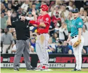  ?? LINDSEY WASSON / GETTY IMAGES ?? Mike Trout and the Los Angeles Angels currently hold the American League’s second wild- card position.