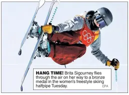  ?? EPA ?? HANG TIME! Brita Sigourney flies through the air on her way to a bronze medal in the women’s freestyle skiing halfpipe Tuesday.