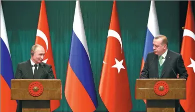  ?? TURKISH PRESIDENTI­AL PRESS SERVICE VIA AGENCE FRANCE-PRESSE UNITED STATES ?? Turkish President Recep Tayyip Erdogan (right) holding a joint news conference with Russian President Vladimir Putin in Ankara on Monday. They warned Donald Trump’s recognitio­n of Jerusalem as the capital of Israel risks escalating regional tension.