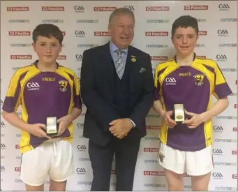  ??  ?? Conor Murphy and Mark Doyle with national President Joe Masterson after their Under-14 victory.