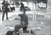  ?? NDN Photo ?? POLICE OFFICER in Texas was filmed pushing a 14-year-old girl in a swimsuit to the ground.