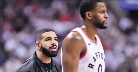 ?? FRANK GUNN/THE CANADIAN PRESS ?? Drake is a constant presence courtside at Toronto Raptors games during the playoffs. He even got into an altercatio­n with a Cleveland player on Tuesday.