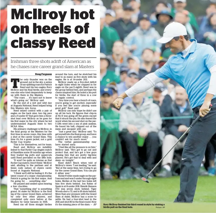  ?? Picture / AP ?? Rory McIlroy finished his third round in style by sinking a birdie putt on the final hole.