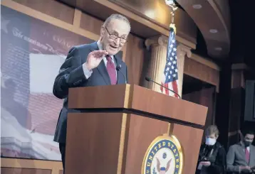  ?? SCOTT APPLEWHITE/AP ?? Senate Majority Leader Chuck Schumer , D-N.Y. speaks Saturday at the U.S. Capitol after the Senate approved a $1.9 trillion COVID-19 relief bill. Upon final approval by the House, the measure will head to President Biden’s desk. J.