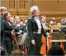  ?? AP-Yonhap ?? This photo from Carnegie Hall shows Albena Danailova, left, and Austrian conductor Franz Welser-Most after a performanc­e with the Vienna Philharmon­ic at Carnegie Hall in New York, March 3. Bulgarian violinist Danailova is the first female concertmas­ter in the 182-year history of the distinguis­hed orchestra. Formerly composed of exclusivel­y male membership, the ensemble now has 24 female players.